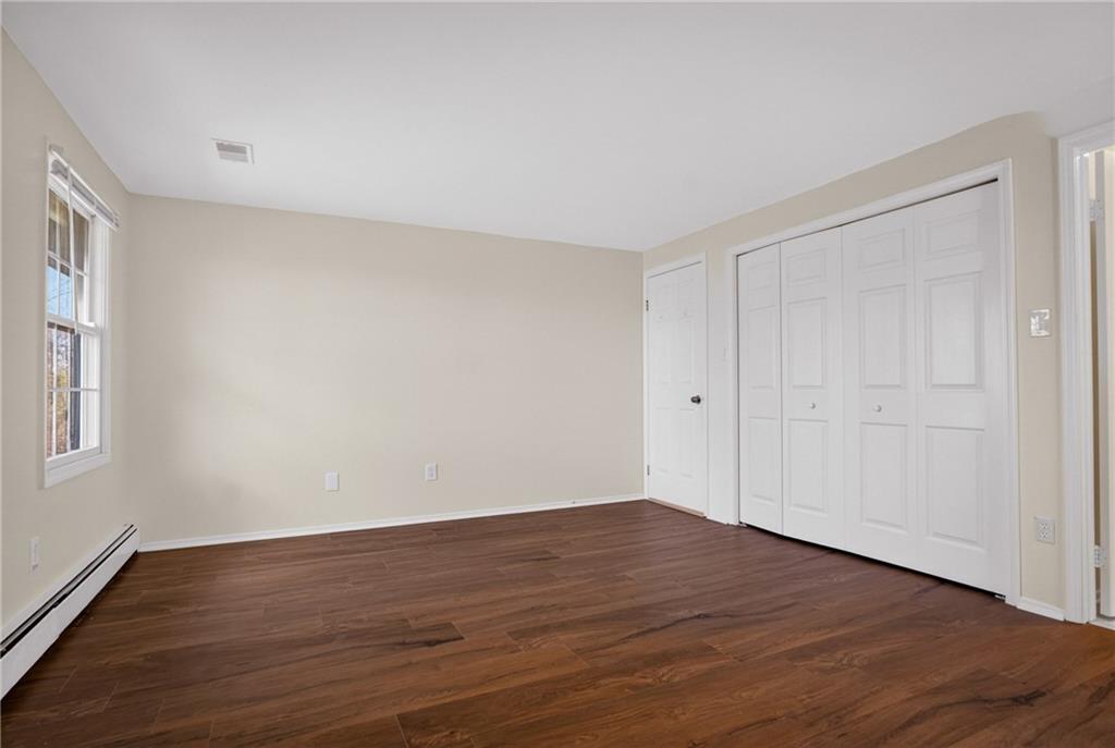 1768 Taper Drive Pittsburgh, PA 15241 - Photo 24 of 48 a view of an empty room with wooden floor and a window