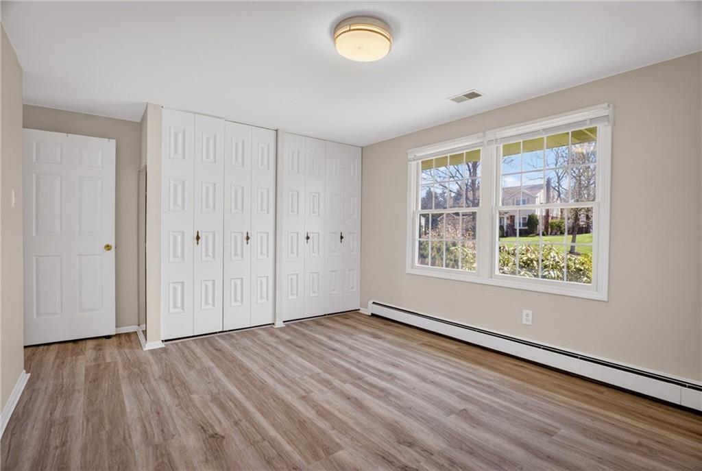 1768 Taper Drive Pittsburgh, PA 15241 - Photo 27 of 48 a view of an empty room with wooden floor and a window