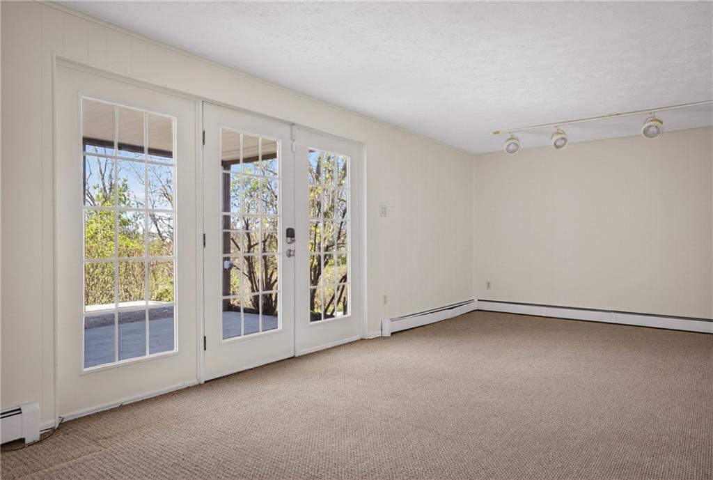 1768 Taper Drive Pittsburgh, PA 15241 - Photo 36 of 48 a view of an empty room with wooden floor and a window