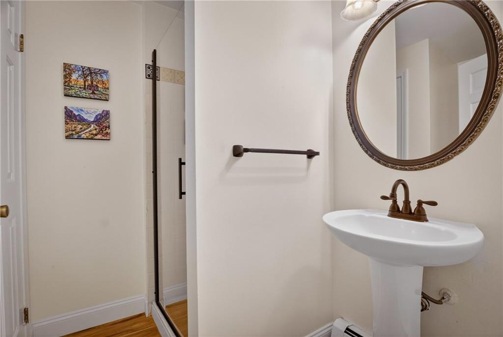 1768 Taper Drive Pittsburgh, PA 15241 - Photo 39 of 48 a bathroom with a sink and a mirror