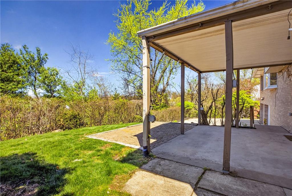 1768 Taper Drive Pittsburgh, PA 15241 - Photo 43 of 48 a view of a patio with table and chairs potted plants