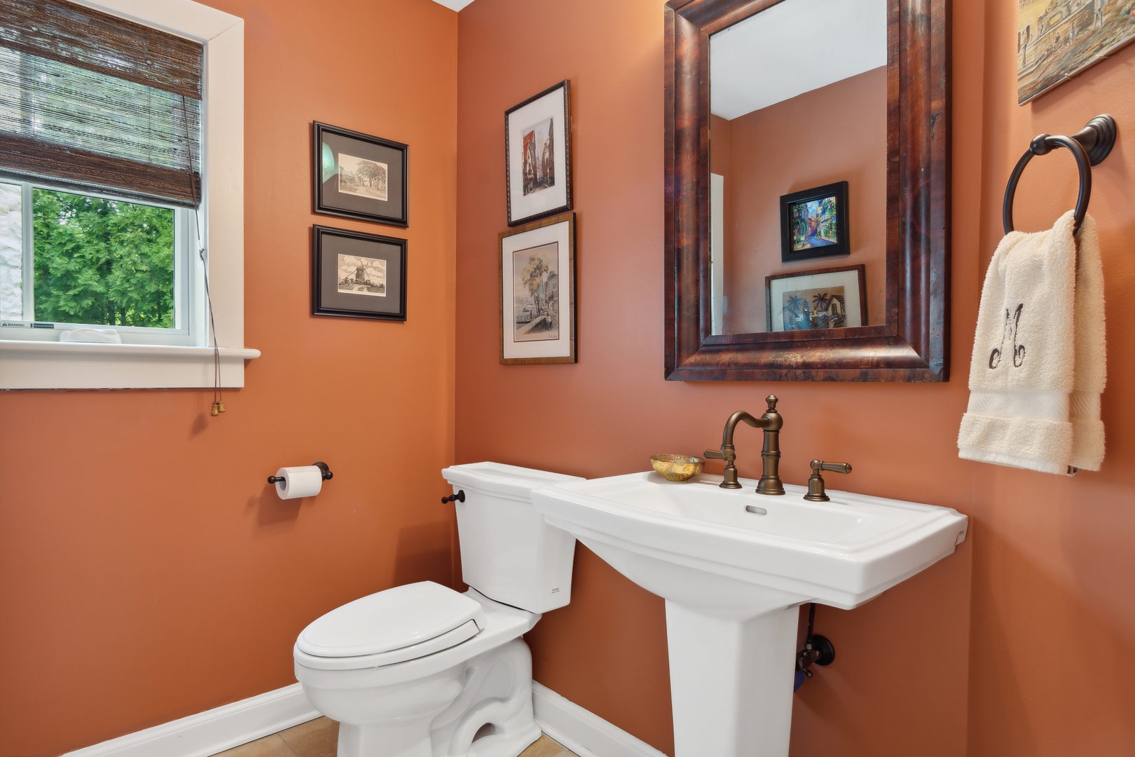 940 Private Road Winnetka, IL 60093 - Photo 34 of 68 a bathroom with a toilet a sink and mirror