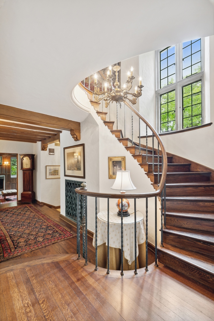 940 Private Road Winnetka, IL 60093 - Photo 37 of 68 a view of entryway and hall with wooden floor