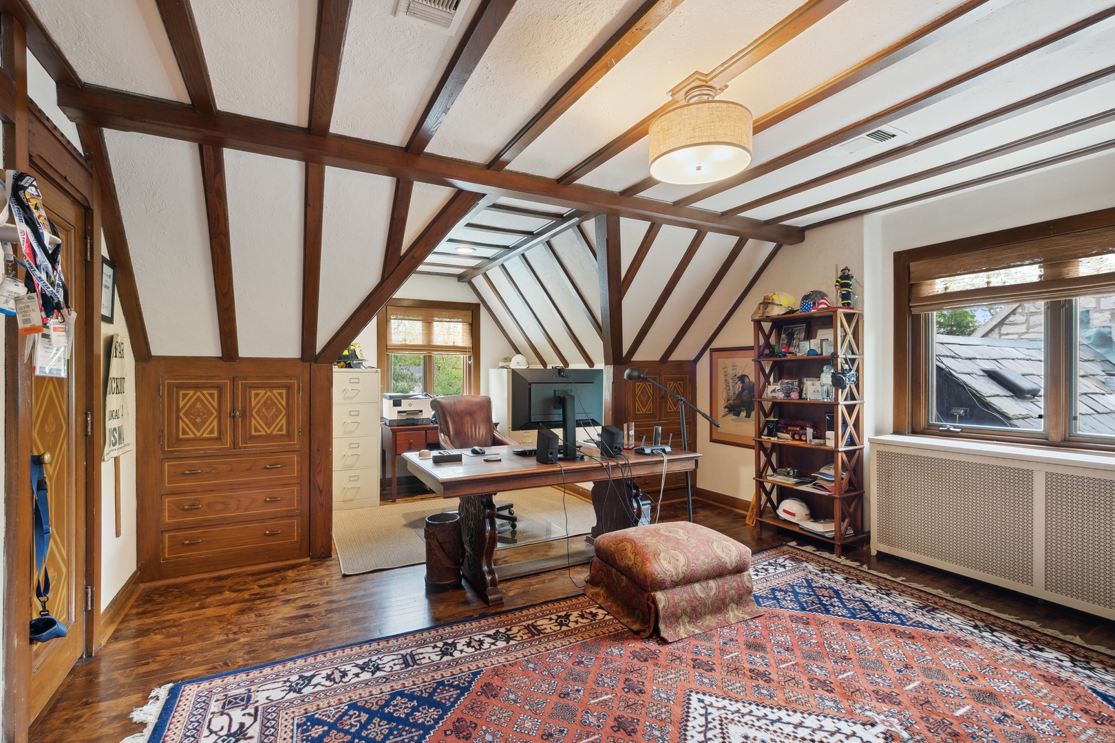 940 Private Road Winnetka, IL 60093 - Photo 56 of 68 a room with stainless steel appliances kitchen island granite countertop furniture and a fireplace
