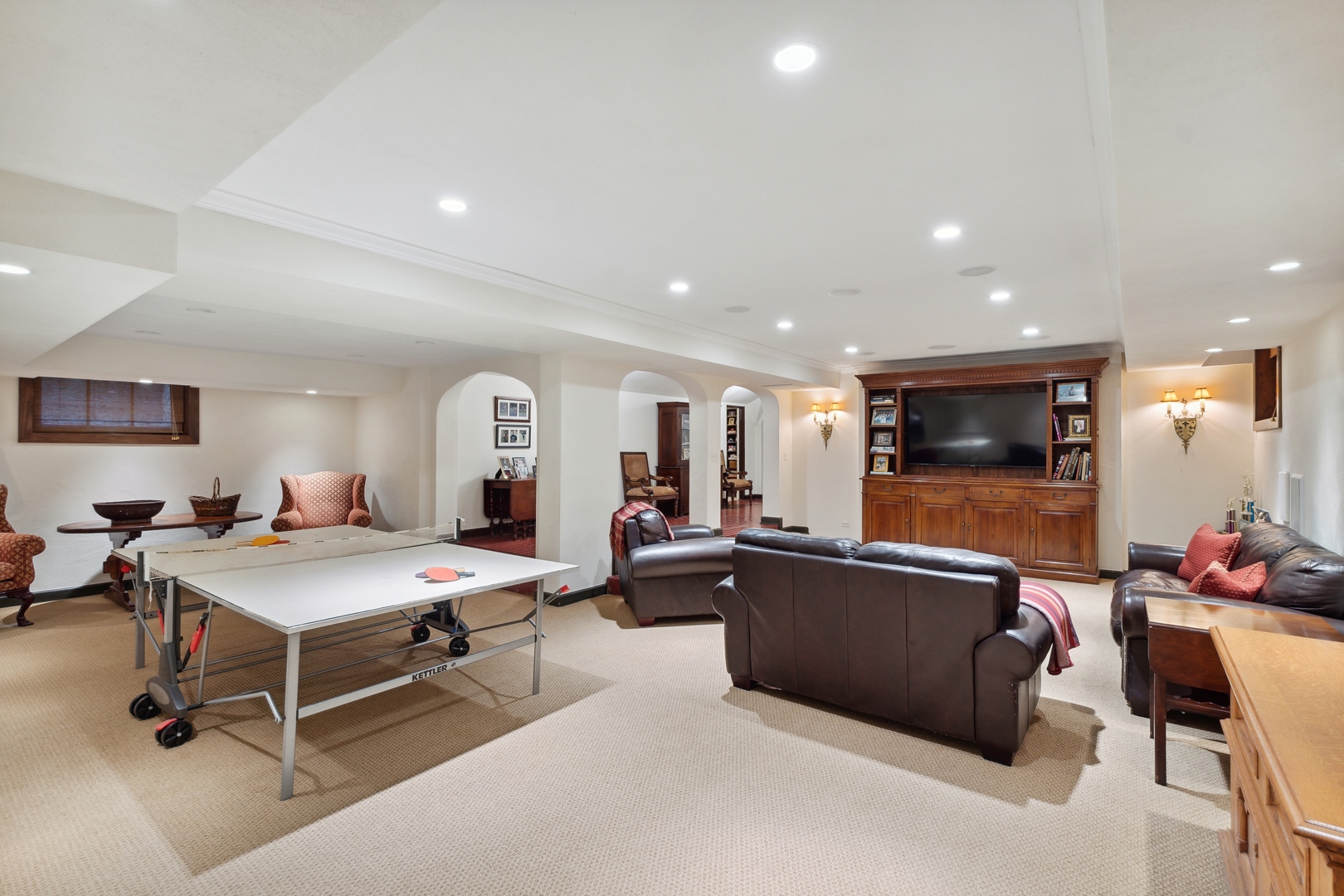 940 Private Road Winnetka, IL 60093 - Photo 61 of 68 a living room with furniture and a flat screen tv