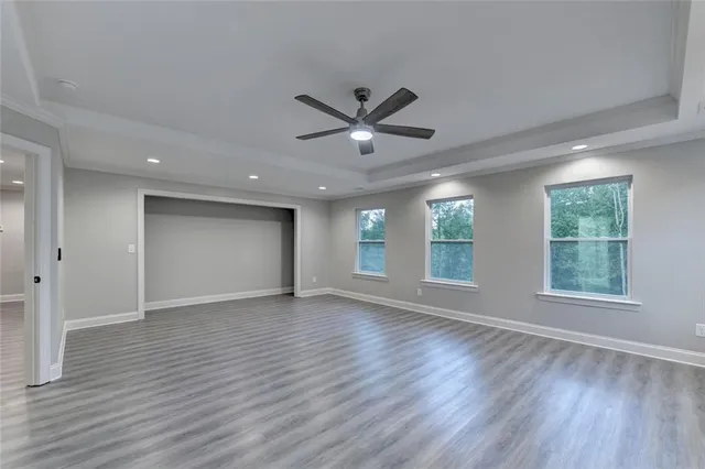 a view of balcony with wooden floor