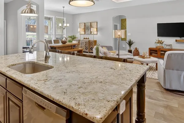 an aerial view of a house with a mountain