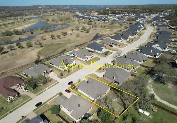 front view of a house with a big yard