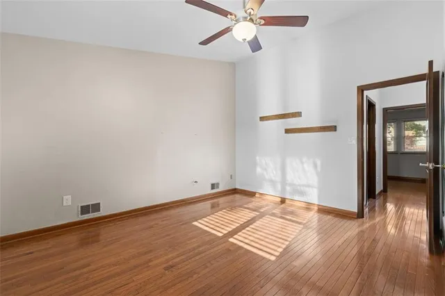 a view of a staircase with wooden floor and staircase