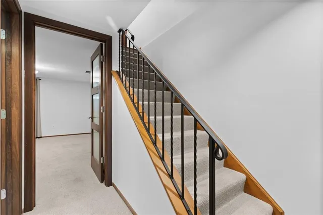 a bathroom with a sink a shower and a mirror