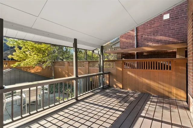 a patio with table and chairs