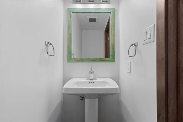 a kitchen with a stove and a sink