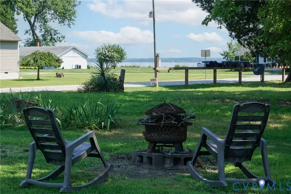a view of a table and chairs in the garden