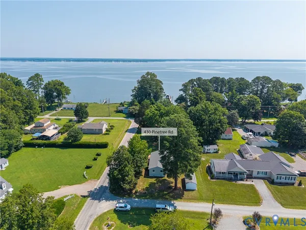 an aerial view of a house with a garden