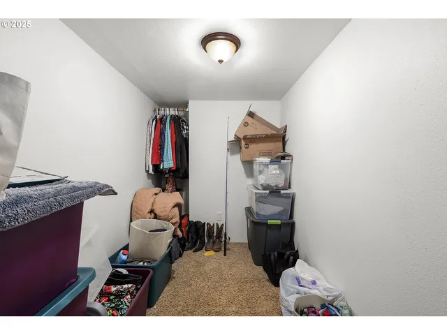 a view of living room with washer and dryer