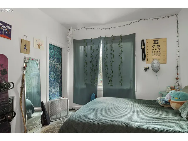 a view of a bathroom with a sink and mirror