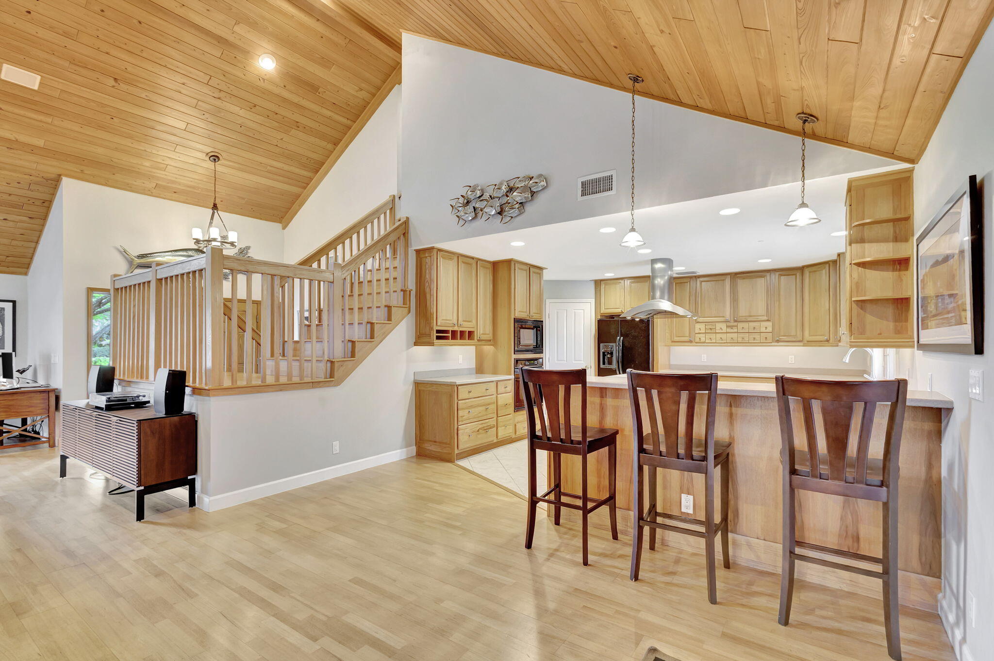 18199 April Lane Jupiter, FL 33458 - Photo 15 of 70 a view of a dining room with furniture