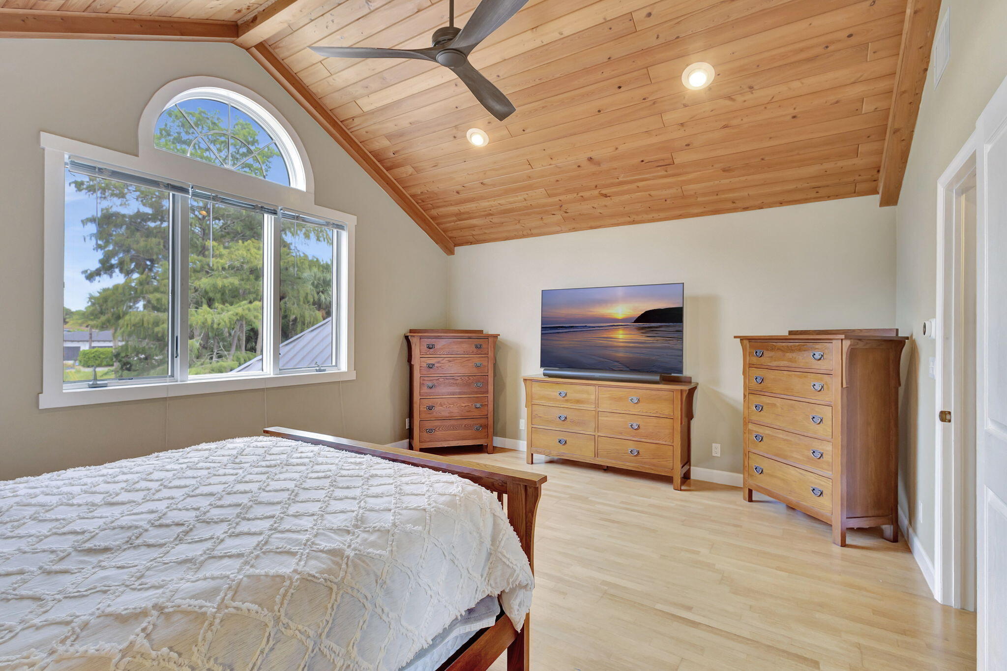 18199 April Lane Jupiter, FL 33458 - Photo 28 of 70 a bedroom with furniture and a window