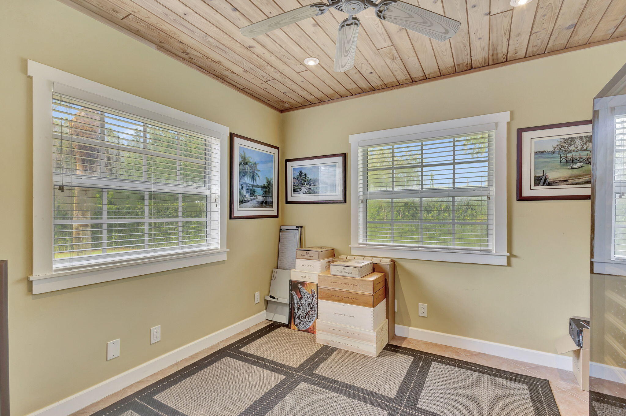 18199 April Lane Jupiter, FL 33458 - Photo 40 of 70 a living room with furniture and a window
