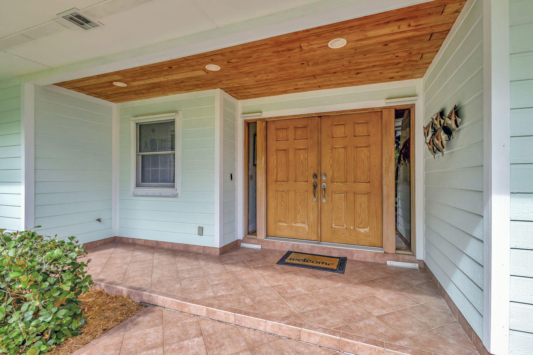 18199 April Lane Jupiter, FL 33458 - Photo 4 of 70 a view of a front door