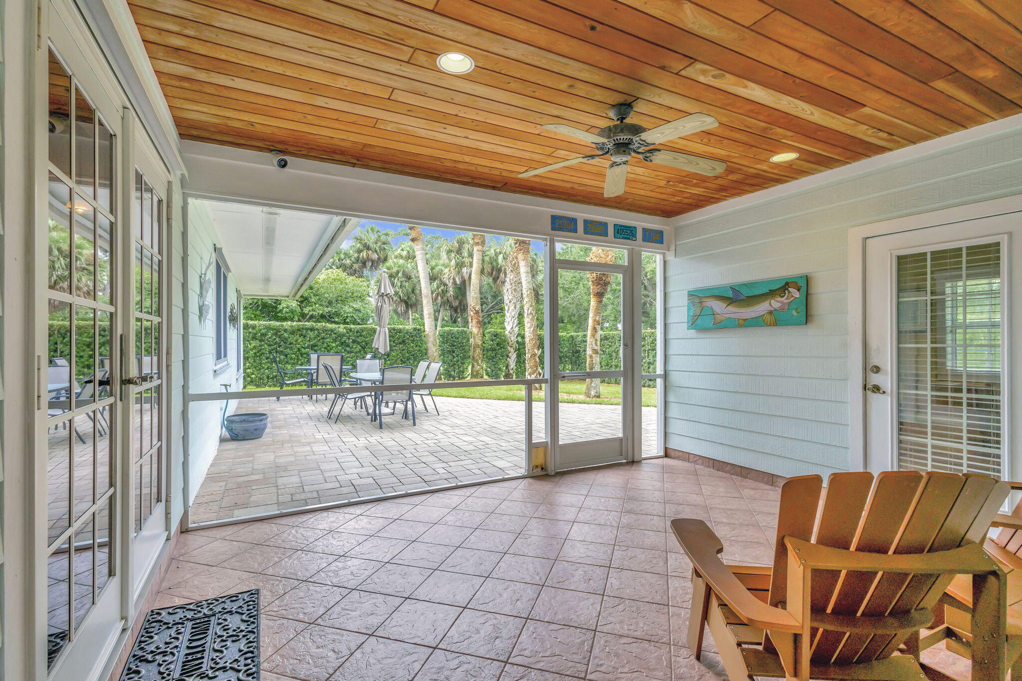 18199 April Lane Jupiter, FL 33458 - Photo 43 of 70 a outdoor space with patio the couches and pool