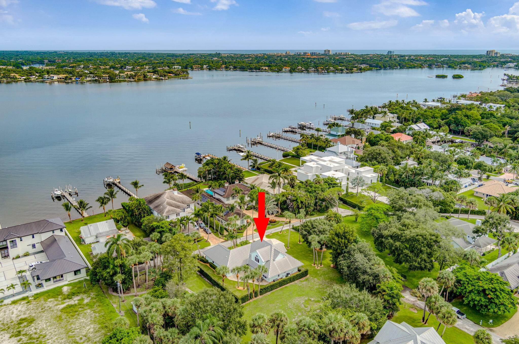 18199 April Lane Jupiter, FL 33458 - Photo 67 of 70 an aerial view of lake residential house with swimming pool and green space