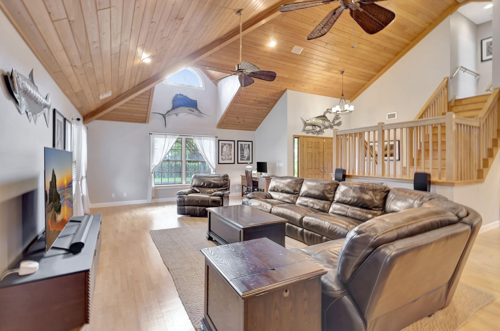 18199 April Lane Jupiter, FL 33458 - Photo 9 of 70 a living room with furniture and a flat screen tv