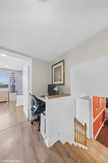 a room with furniture and a wooden floor