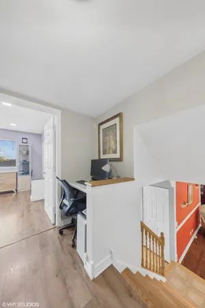 a room with furniture and a wooden floor