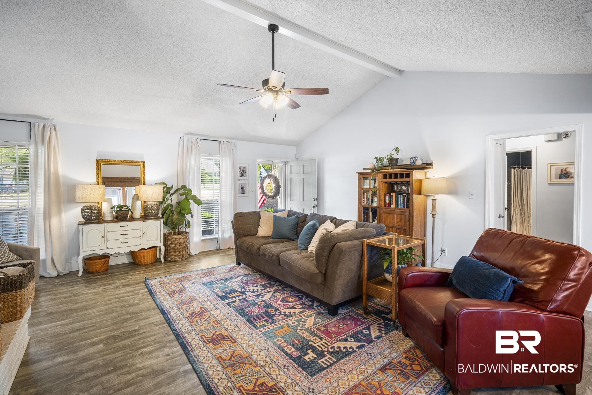 117 Richmond Road Daphne, AL 36526 - Photo 8 of 41 Living room with ceiling fan, a textured ceiling, healthy amount of natural light, and wood finished floors