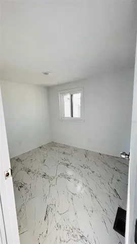 a view of a bedroom with a sink