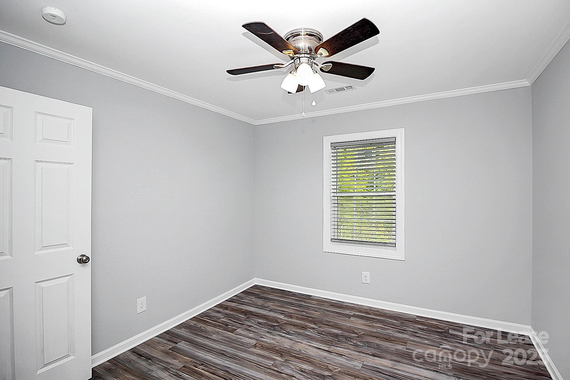 1027 Little Avenue, Unit D Gastonia, NC 28052 - Photo 15 of 20 a view of an empty room with a window