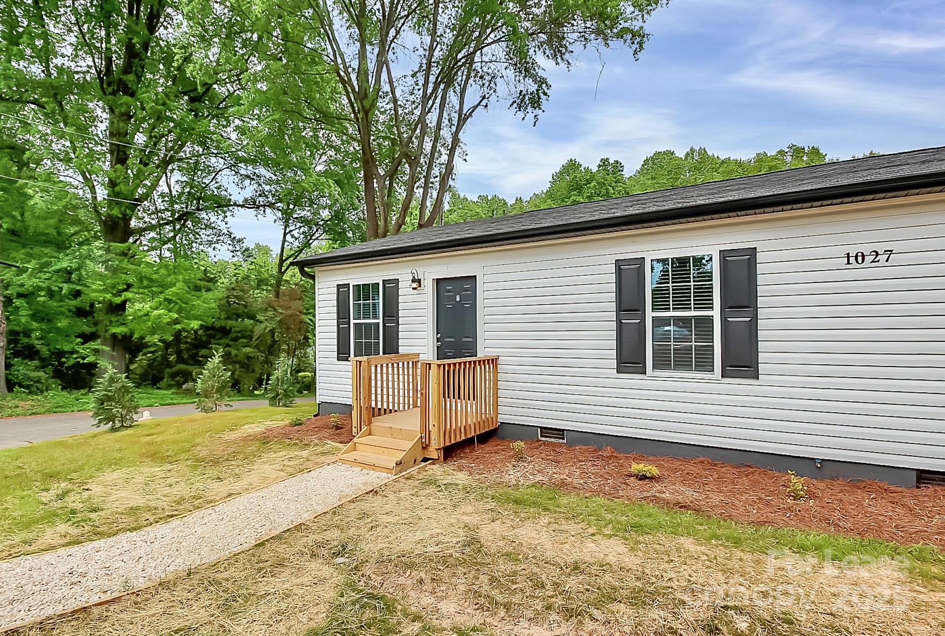 1027 Little Avenue, Unit D Gastonia, NC 28052 - Photo 20 of 20 a view of a house with a backyard