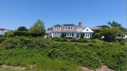 58 Pond Street Chatham, MA 02633 - Photo 2 of 38 a front view of a house with a yard