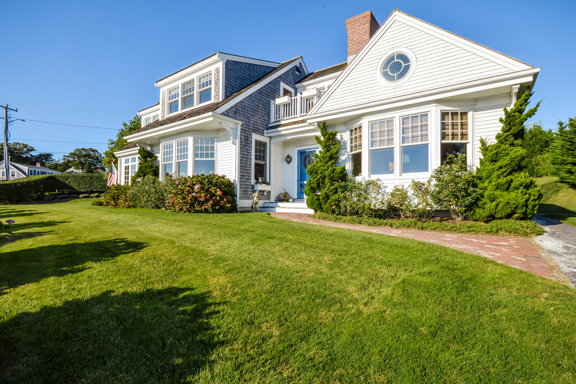58 Pond Street Chatham, MA 02633 - Photo 5 of 38 a front view of a house with a yard