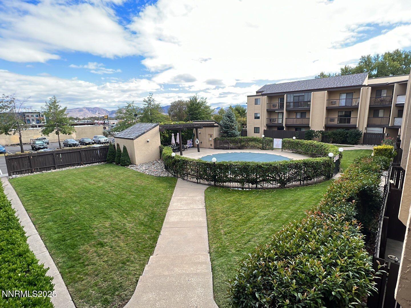 2450 Lymbery Street, Unit 311 Reno, NV 89509 - Photo 11 of 13 a view of a backyard with garden