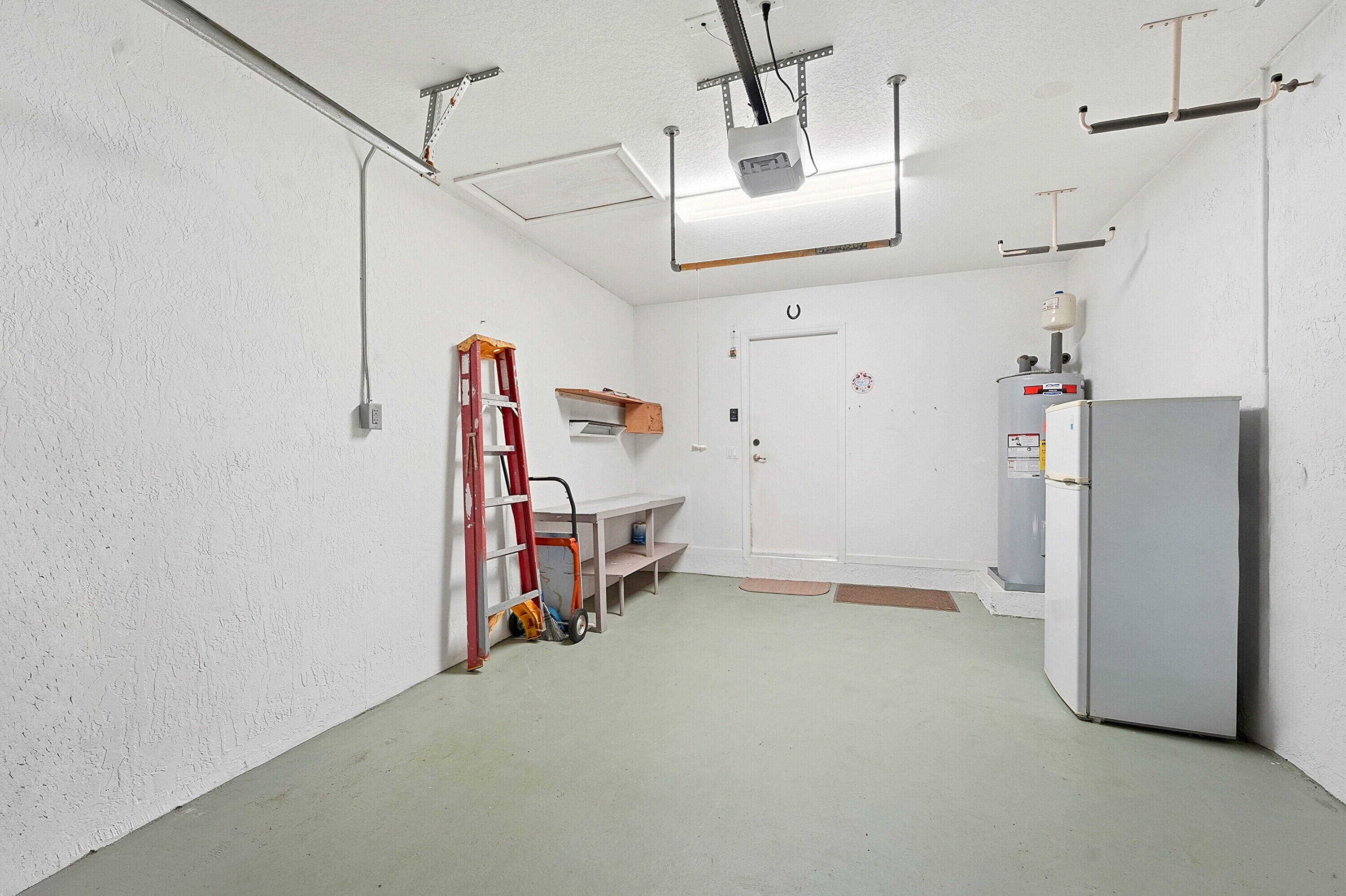 5511 Crossing Rocks Court Riviera Beach, FL 33407 - Photo 31 of 49 31 Garage 2jpg