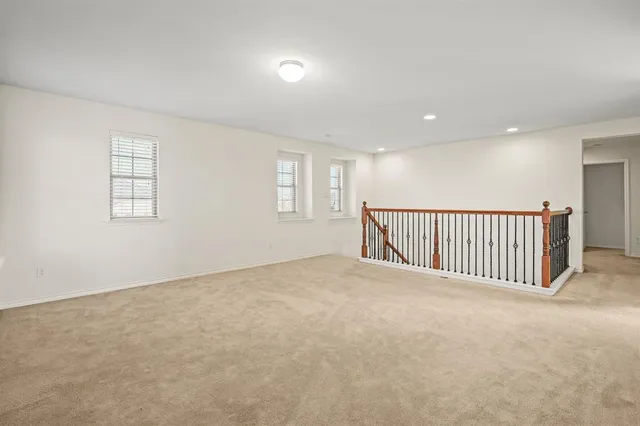 a view of a livingroom with a staircase