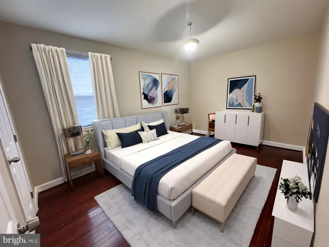 a bed room with a bed and a window