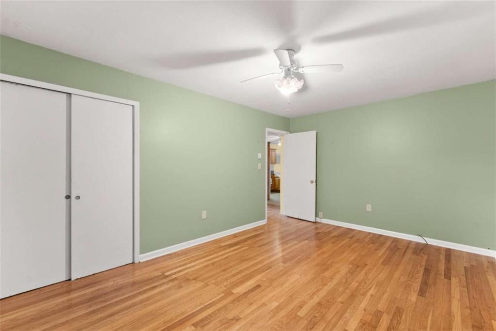 3772 Ledan Road Gainesville, GA 30506 - Photo 18 of 33 wooden floor in an empty room with a window