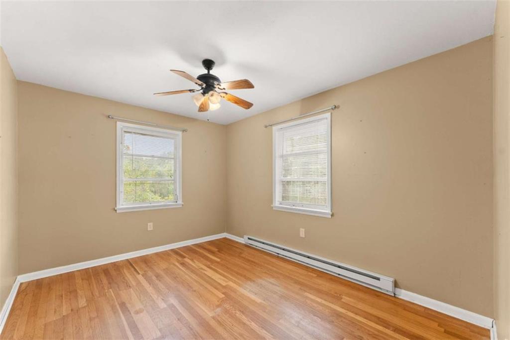 3772 Ledan Road Gainesville, GA 30506 - Photo 20 of 33 a view of empty room with wooden floor and fan