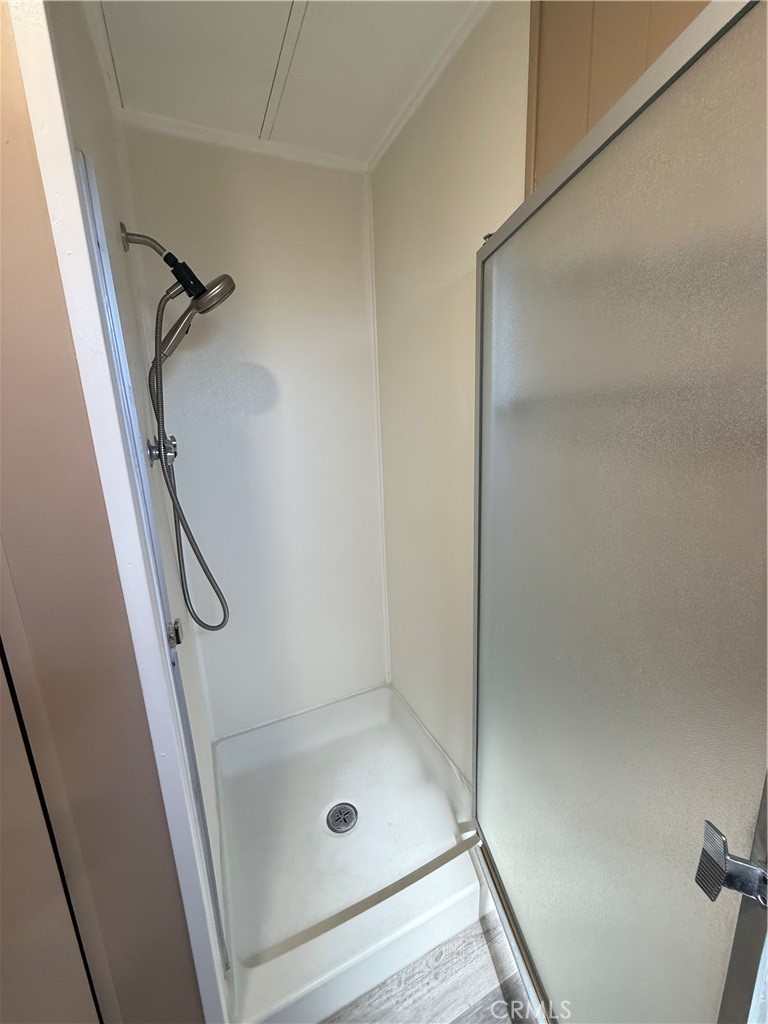 2240 Golden Oak Lane, Unit 108 Merced, CA 95341 - Photo 20 of 30 a bathroom with a glass shower door