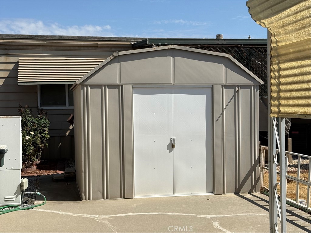 2240 Golden Oak Lane, Unit 108 Merced, CA 95341 - Photo 30 of 30 a house with a glass door