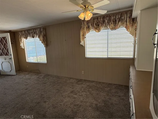 a view of entryway and hall with a window
