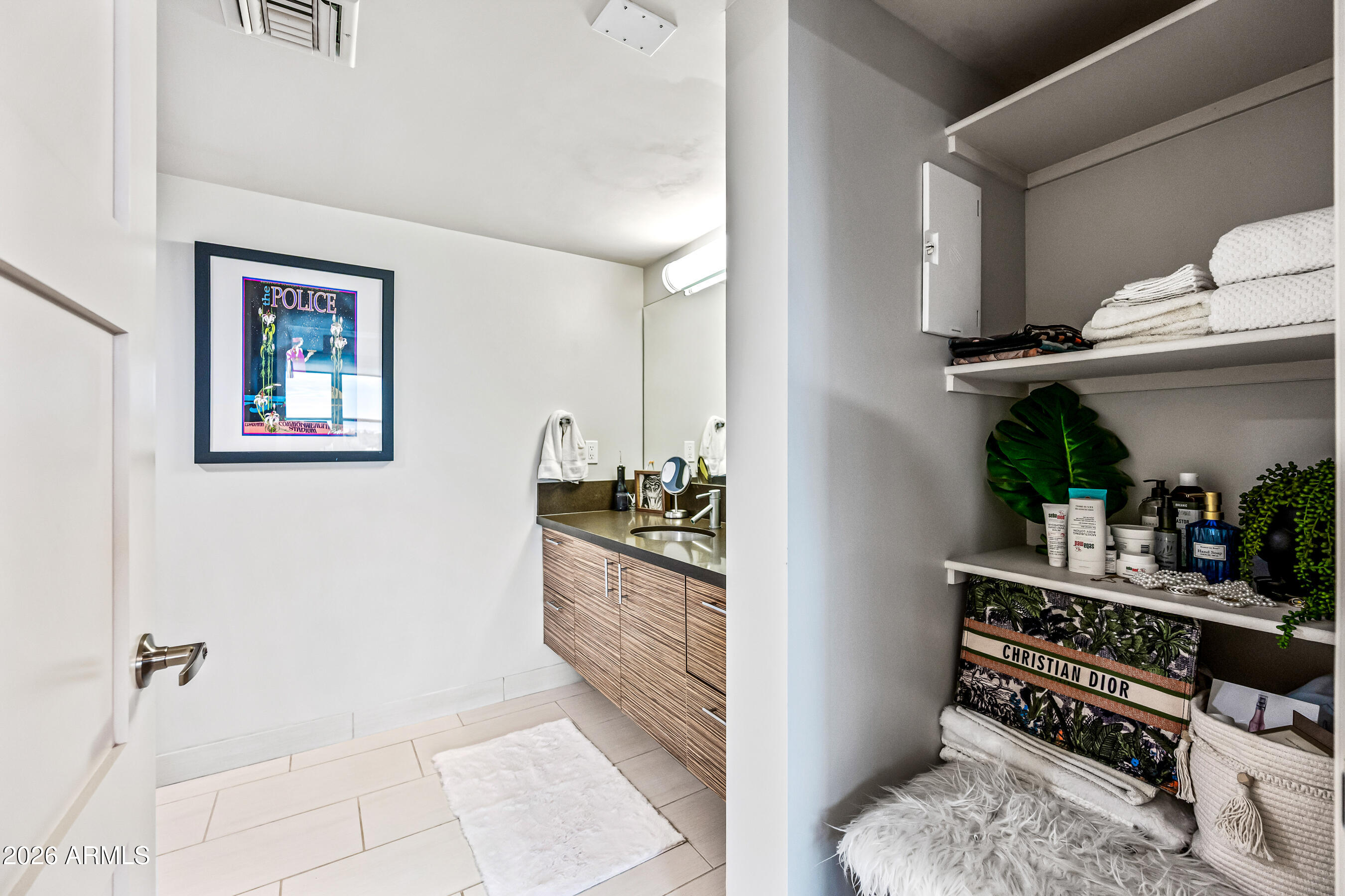 535 West Thomas Road, Unit 407 Phoenix, AZ 85013 - Photo 19 of 42 a kitchen with stainless steel appliances granite countertop a refrigerator and a stove