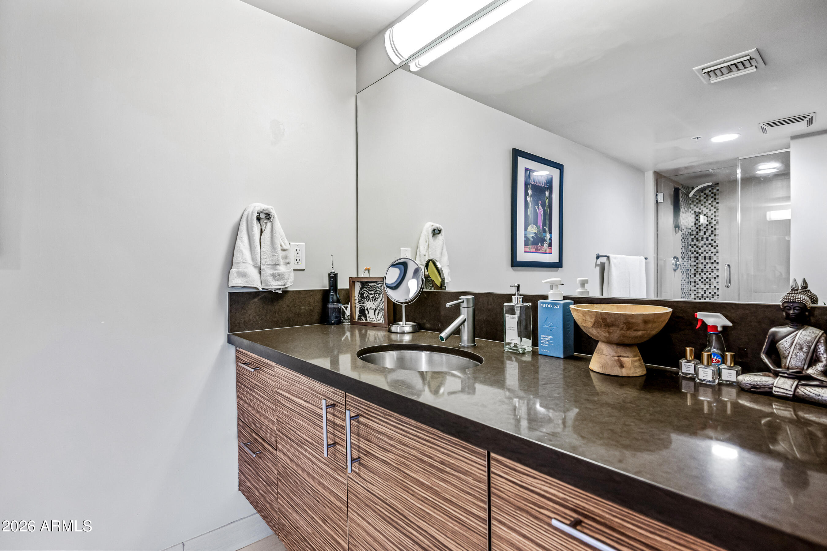 535 West Thomas Road, Unit 407 Phoenix, AZ 85013 - Photo 20 of 42 a kitchen with counter top space and living room