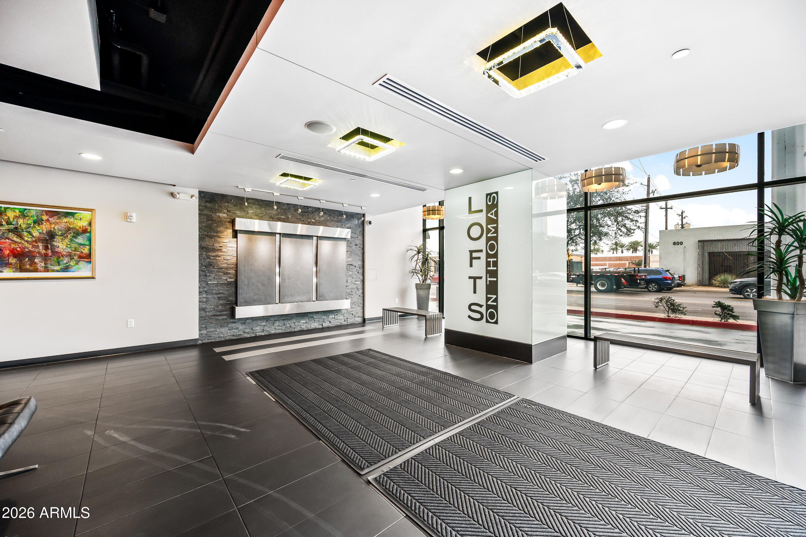 535 West Thomas Road, Unit 407 Phoenix, AZ 85013 - Photo 28 of 42 a view of an entryway with wooden floor