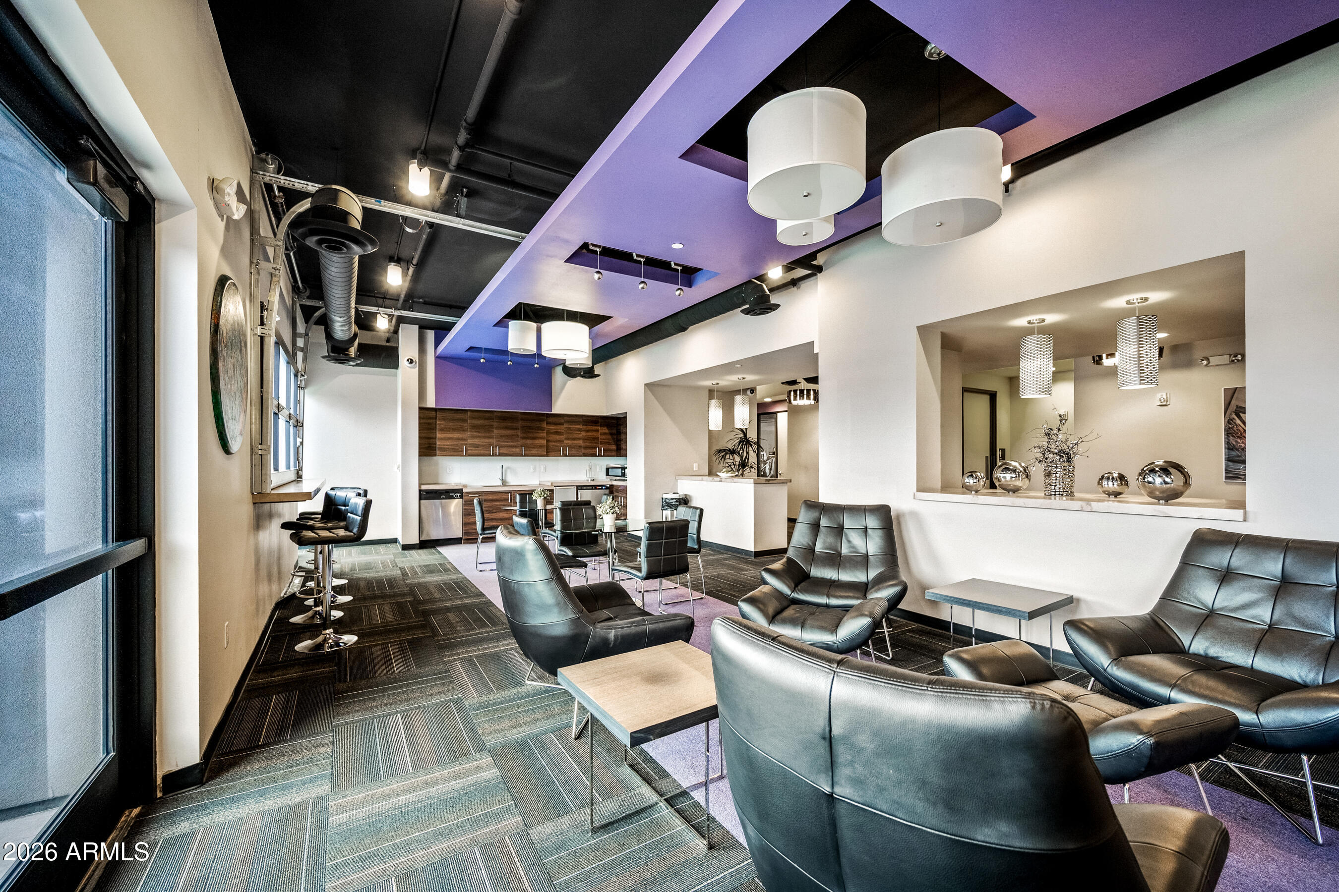 535 West Thomas Road, Unit 407 Phoenix, AZ 85013 - Photo 29 of 42 a living room with furniture and a large window