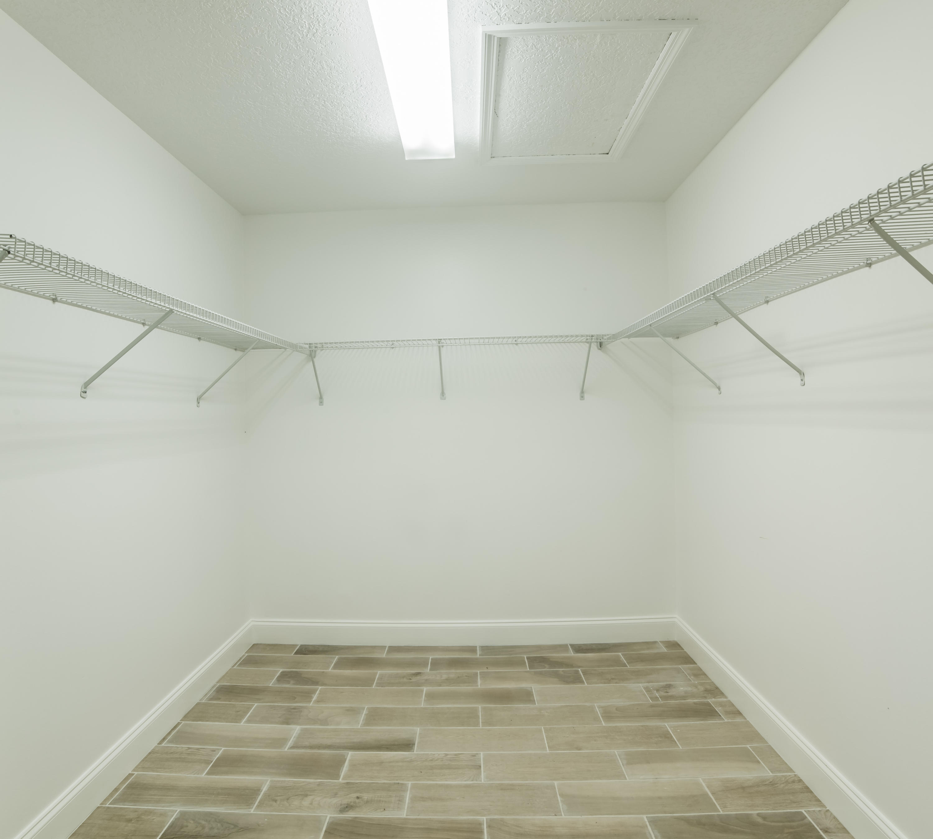 6230 Wood Lake Road Jupiter, FL 33458 - Photo 25 of 44 Master Bedroom WIC.jpg