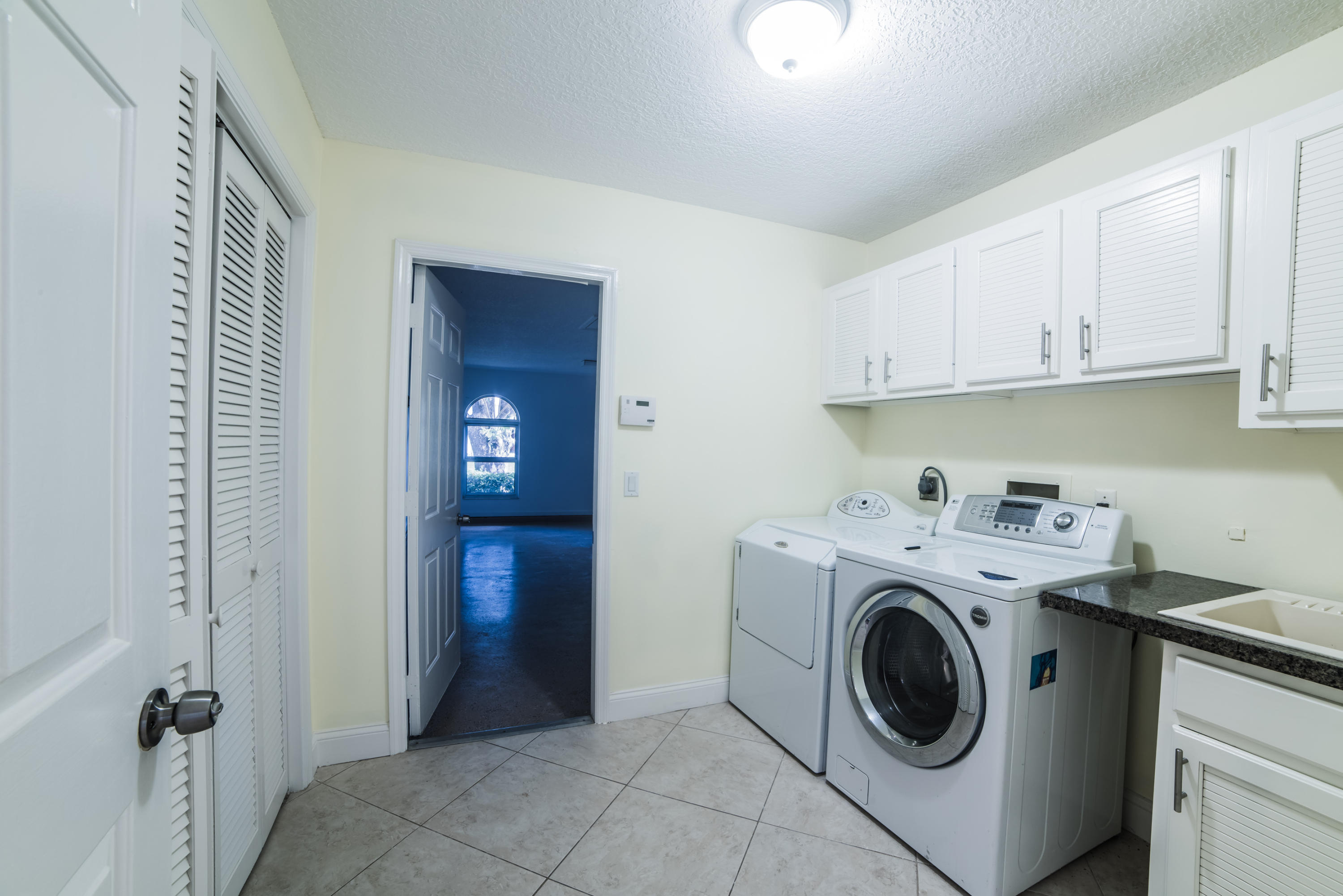 6230 Wood Lake Road Jupiter, FL 33458 - Photo 29 of 44 Utility Room.jpg